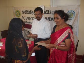 Photo: Prem presenting donations in Hambantota
